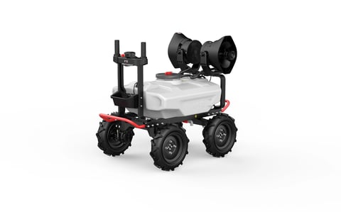Wheeled robotic vehicle with white tank, black wheels, red frame, and mounted speakers on top