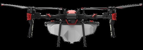 Top-down view of a red and black agricultural spray drone with extended arms and white payload tank
